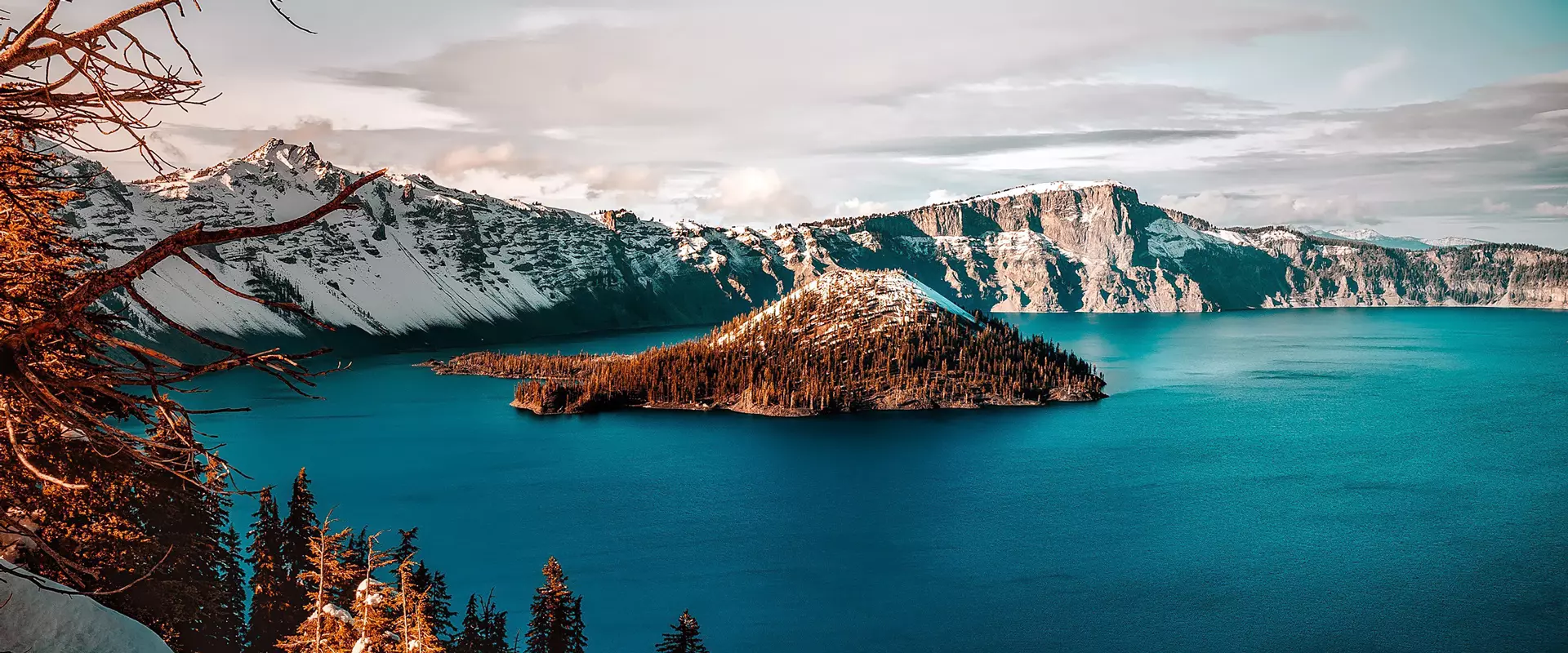 A snowy island in the middle of a lake