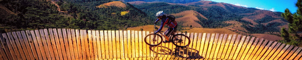Cyclist on the bike path, in the mountains, sunny day